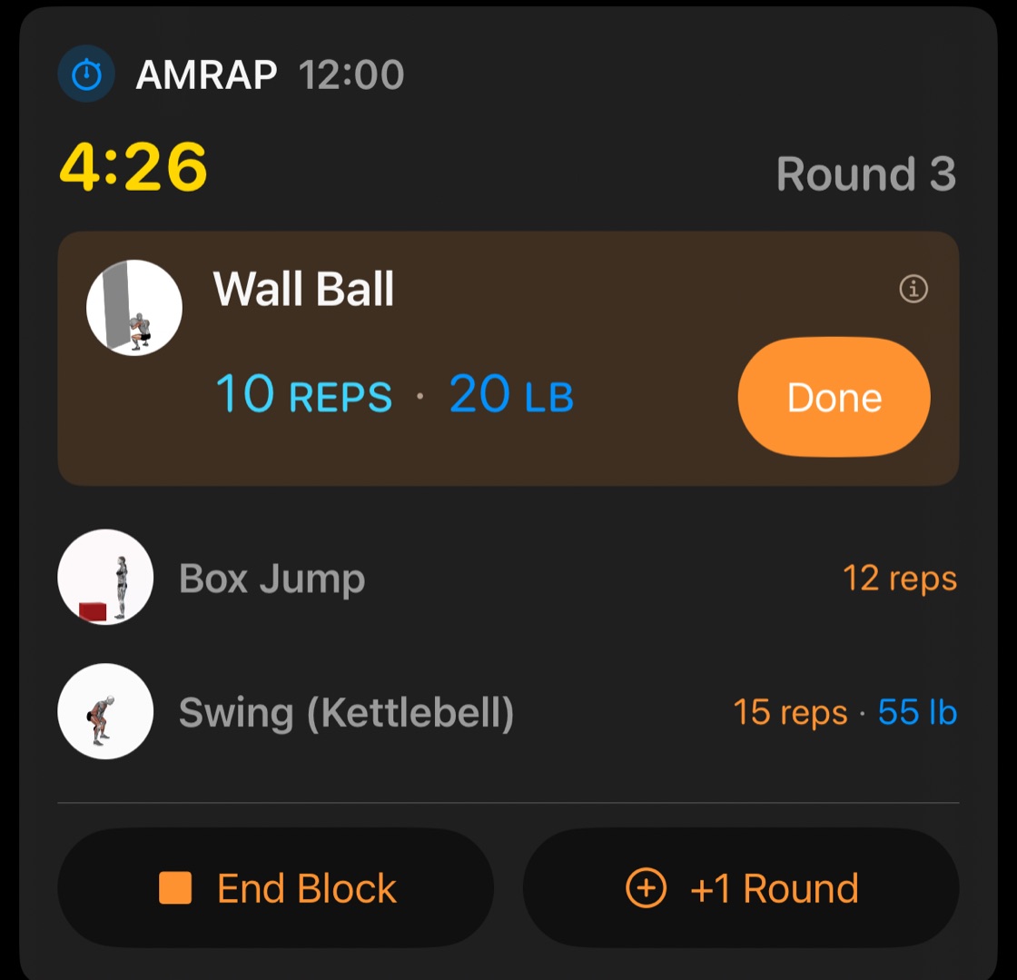 An AMRAP block of 12:00 with 4:26 left, in round 3: Wall Ball, 10 reps at 20 lb, then Box Jump and Swing (Kettlebell), with End Block and +1 Round buttons